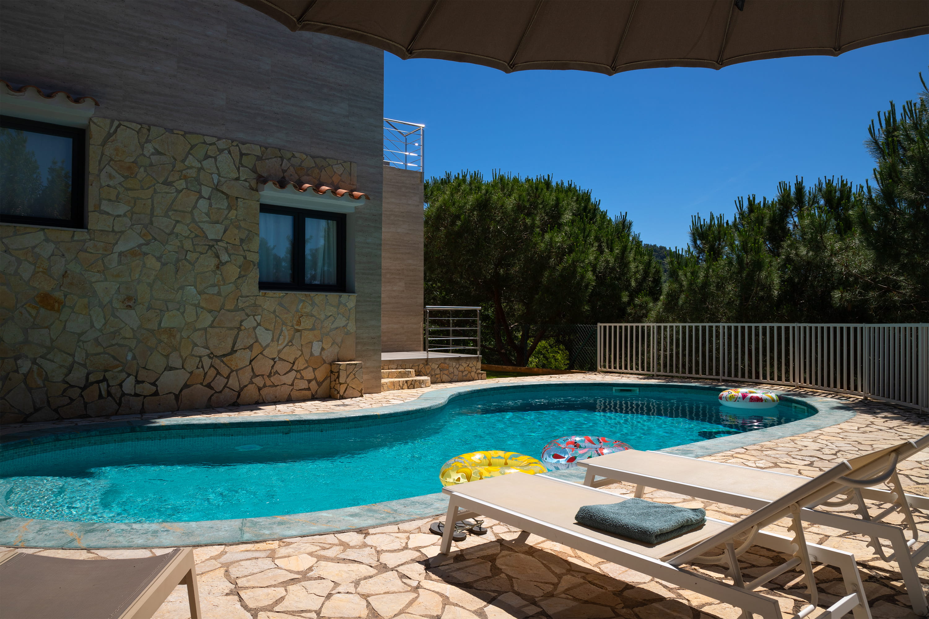 Private pool with sun loungers